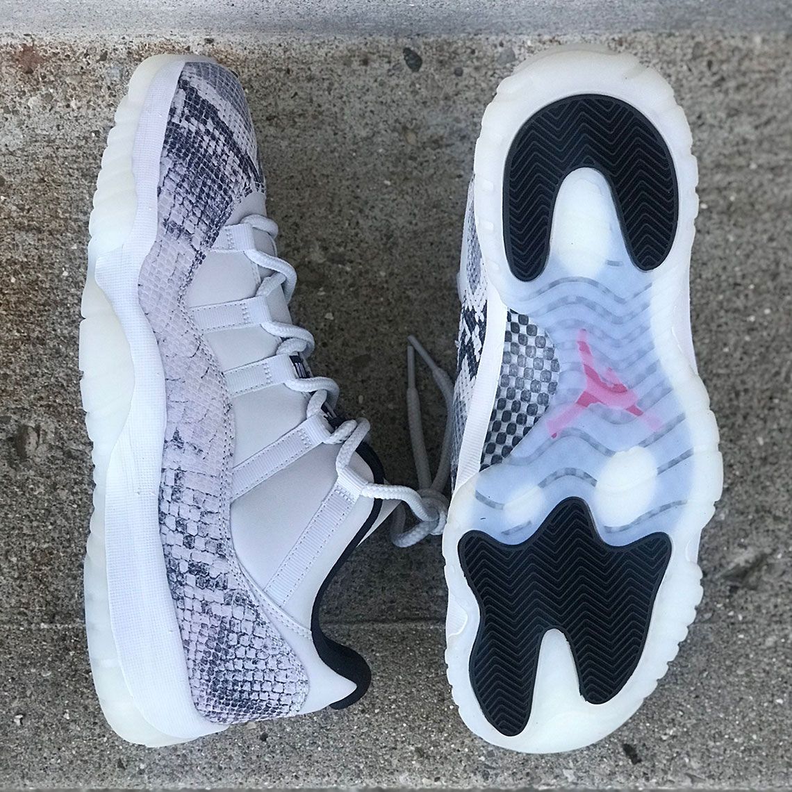 Jordan 11 snakeskin hotsell light bone release date