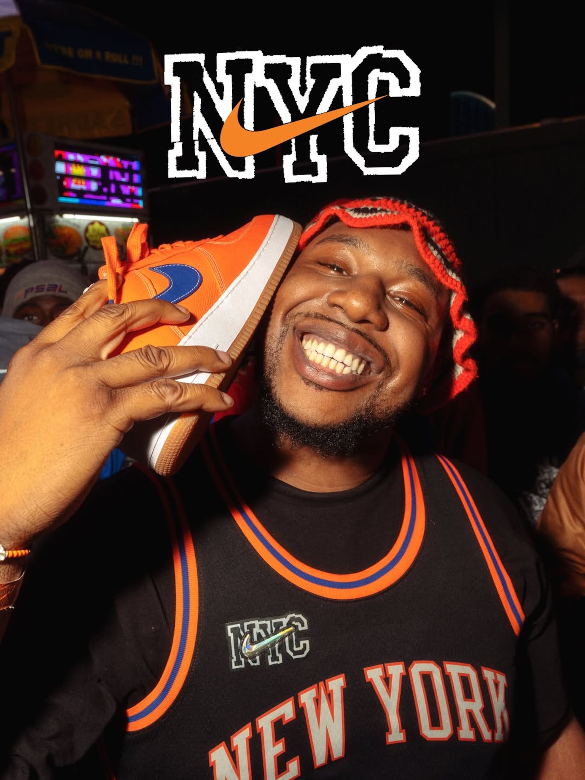 New York Knicks fan with the Knicks-inspired Nike NYC Air Force 1 in orange-and-blue.
