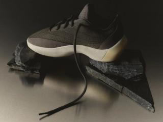 Jerry Lorenzo's Fear of God Athletics Basketball III sneaker by adidas, in a "Cinder" color scheme.