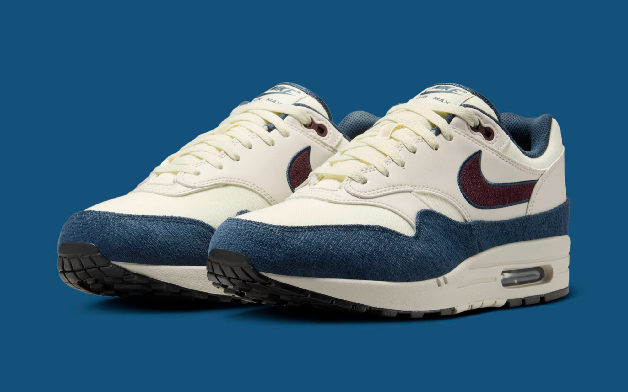 navy and white air max 1