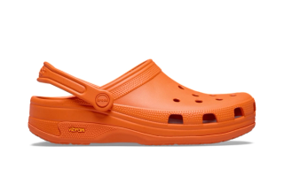 Crocs EXP Classic Clog in a "Orange" color scheme, featuring a Vibram XS TREK EVO outsole.