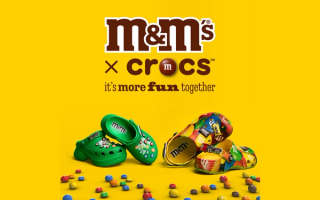 Promotional photo for the M&M'S x Crocs Classic Clog & Bae Clog collaboration.