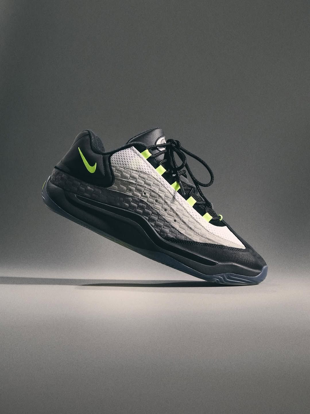 Kevin Durant's Nike KD 18 in a neon yellow and grey color scheme inspired by the Nike Air Max 95. The collab is with Ronnie Fieg's Kith.