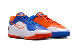 Nike LeBron 23 "Hardwood Classics" basketball sneaker in a "Game Royal/Safety Orange/White" color scheme.