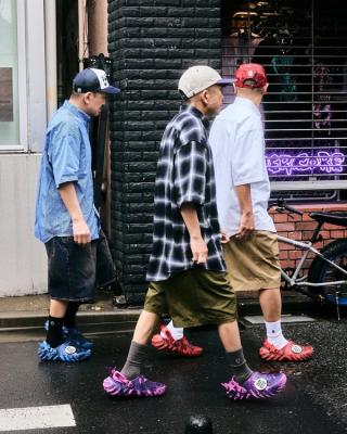 BAPE®︎ & Crocs Echo Clog collaborations, featuring A BATHING APE®︎ COLOR CAMO patterns in blue, red, and purple.