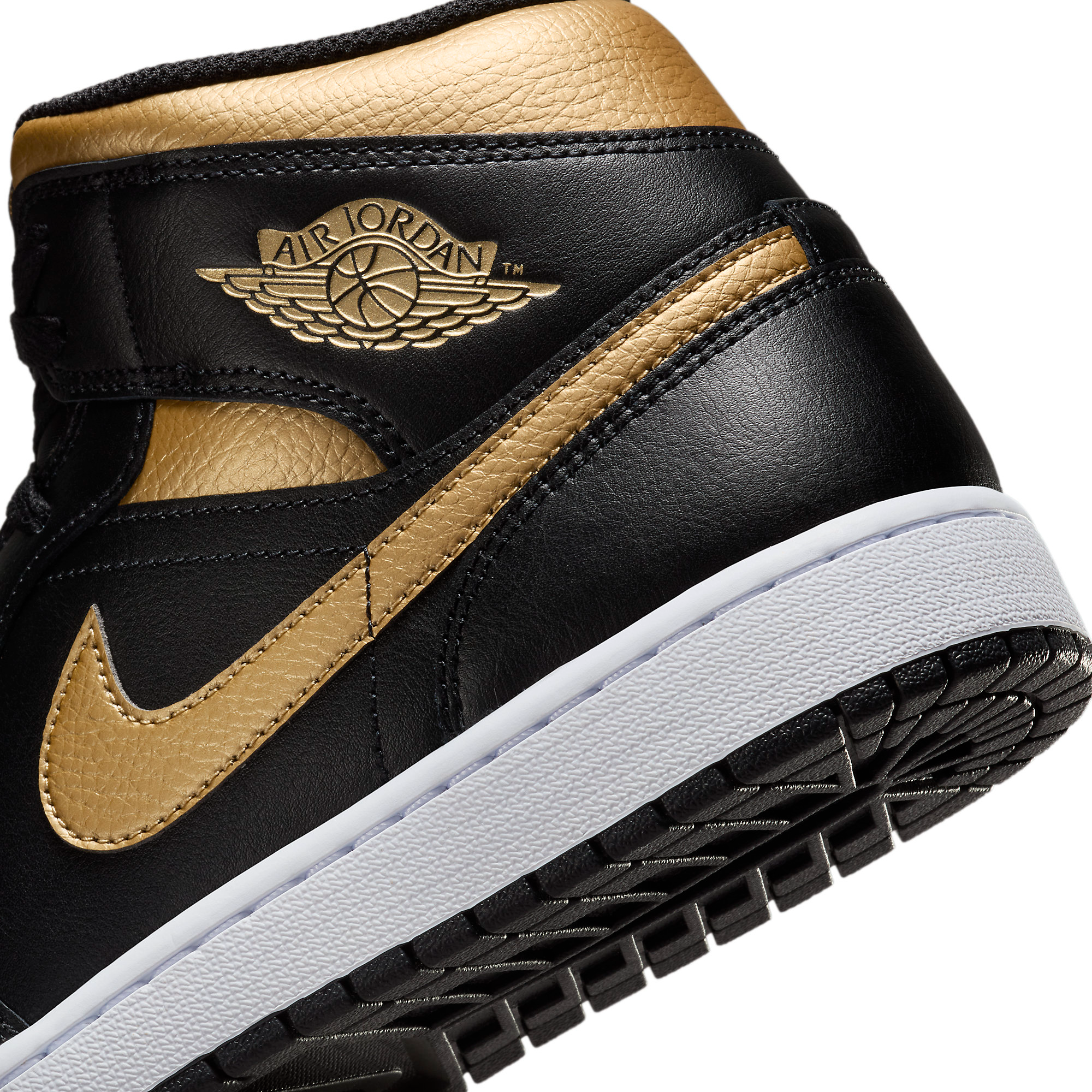 The Jordan 1 Mid is Available Now in Metallic Gold and Black 