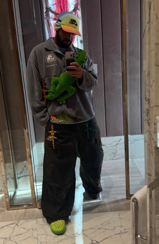 Drake Wearing CPFM x Nike ACG.