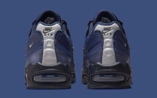 Heel angle of Nike's Air Max 95 Big Bubble in a "Sanded Purple/Obsidian" color scheme.