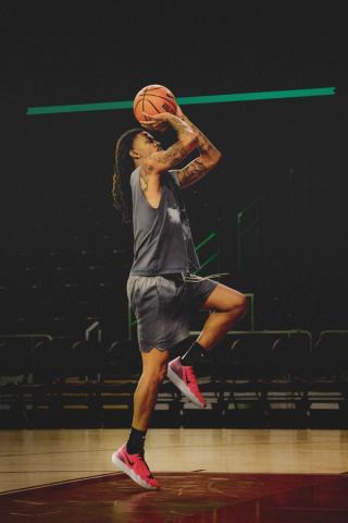 Ja Morant wearing the Nike Twelve Time in a "Solar" colorway. Photo via Nike.
