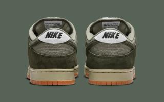 Heel angle of the Nike SB Dunk Low Pro B in a "Sequoia/Oil Green" color scheme.