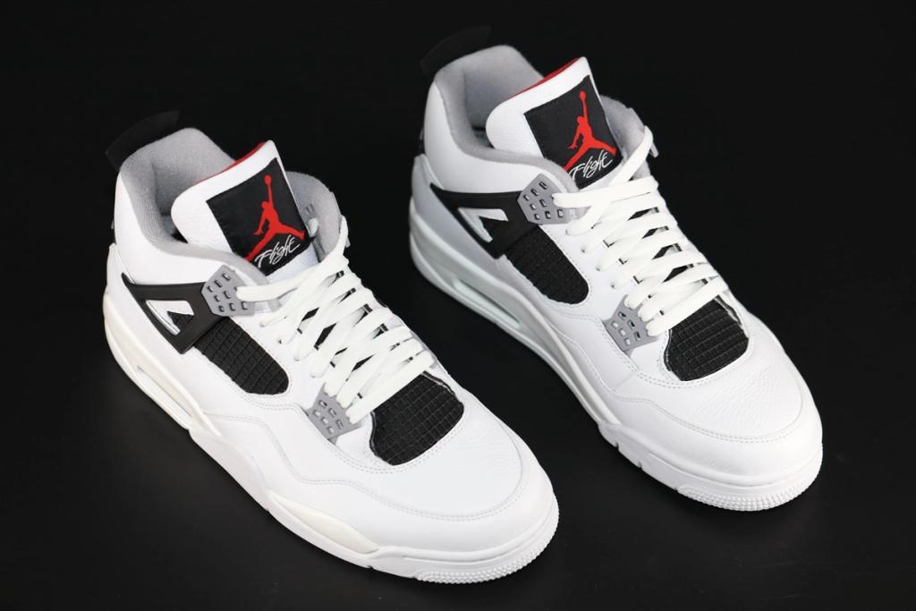 Rare Air Jordan 4 sample in Bulls-inspired colorway with cross-strap cage detail