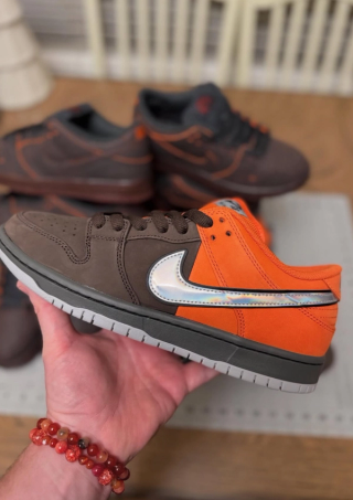Nike SB's Muni Fast Pass-inspired SB Dunk Low Pro in a "Safety Orange" colorway.