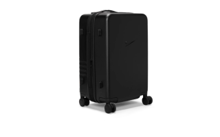 Nike 22-Inch Hardshell Spinner Suitcase in a "Black" finish.