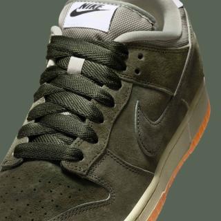 Close-up of the Nike SB Dunk Low Pro B in a "Sequoia/Oil Green" color scheme.