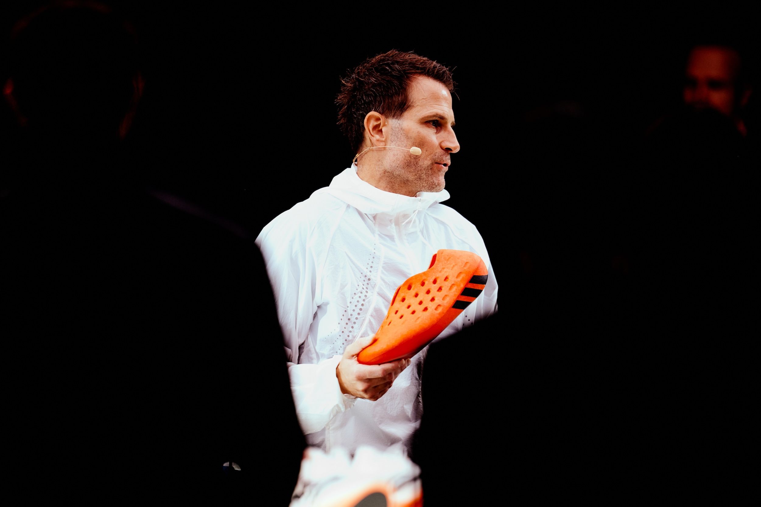 Marc Makowski, SVP of Innovation at adidas, holding the HYPERBOOST 360 recovery clog concept during the brand's Home of Innovation summit in Germany (Sept. 25, 2026)