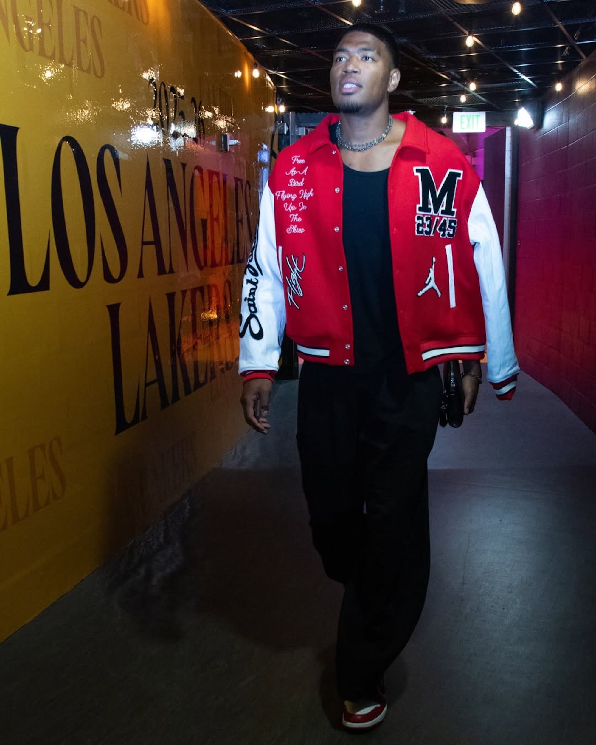 Rui Hachimura wearing Saint Mxxxxxx x Jordan Brand Varsity Jacket.