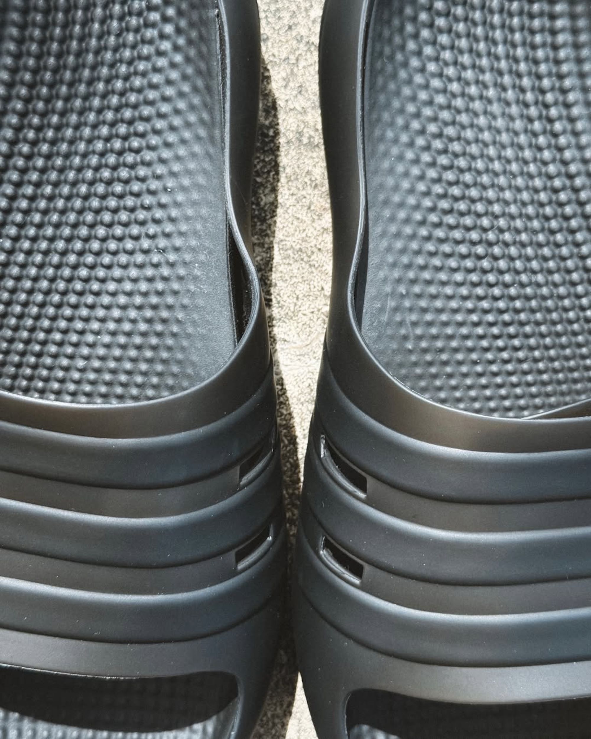 "Core Black" adidas Adislide. Photo via @lustpanama on Instagram.