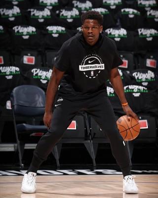 Anthony Edwards wearing the adidas Believe That 1 in white. Photo by Garrett Ellwood/David Sherman.