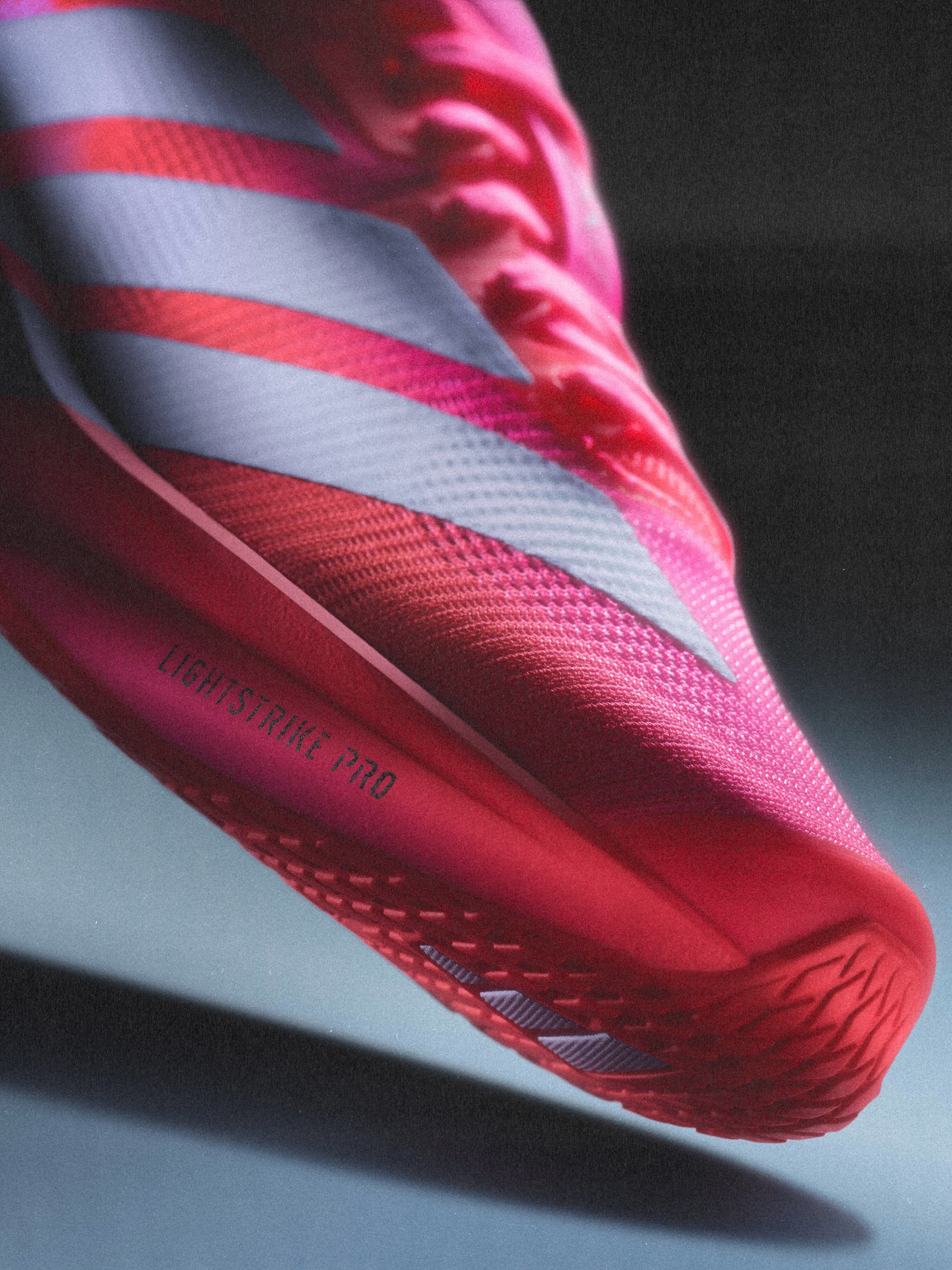 Women's adidas Adizero Dropset Pro "Solar Turbo/Lucid Pink" (SKU: KK1554). Photo via adidas.