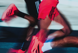 On-Foot: adidas Running's Adizero Adios Pro 5 marathon racer in its debut "Solar Turbo/Core Black/Lucid Red" color scheme.