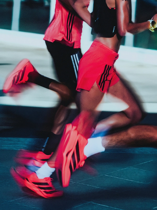 On-Foot: adidas Running's Adizero Adios Pro 5 marathon racer in its debut "Solar Turbo/Core Black/Lucid Red" color scheme.