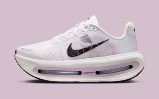 Nike Running's ultra-cushioned Vomero Premium in a "White/Light Lilac/Black" color scheme.