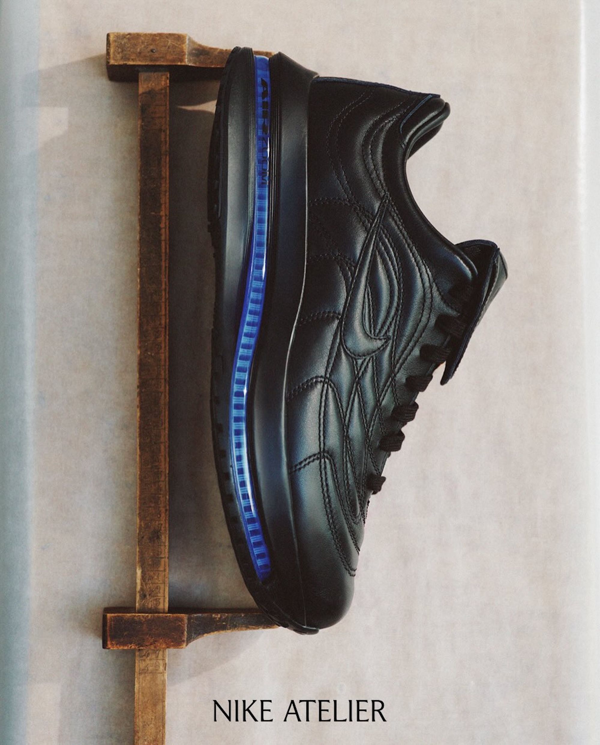Nike Atelier Merc Premium in a black & blue color scheme. Photo via Nike.
