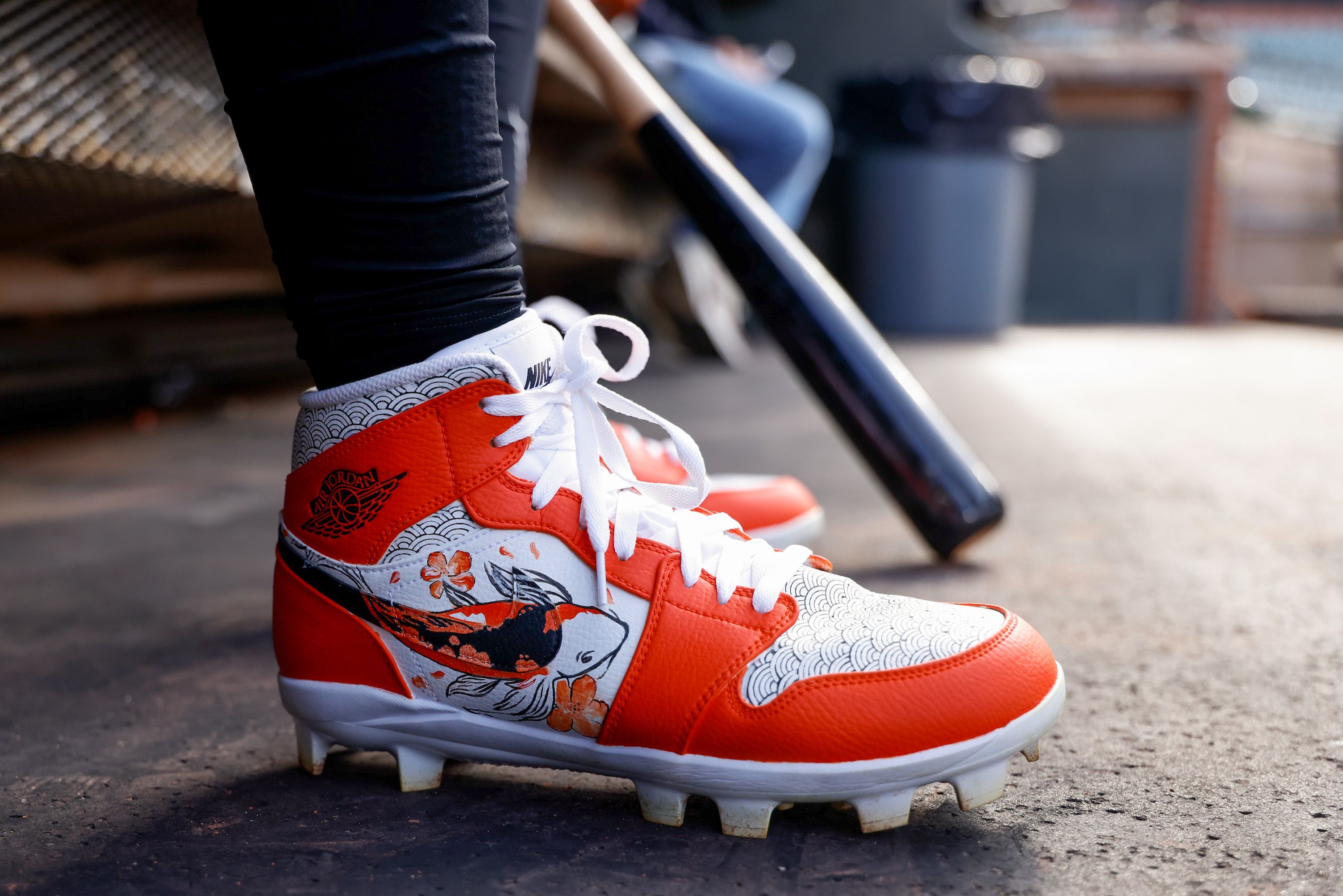 Christian Franklin's Koi-Inspired Air Jordan 1 Mid Cleats. Photos via MLB.