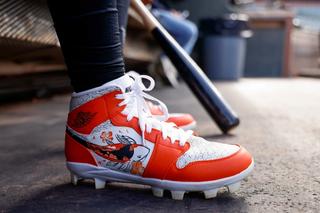 Christian Franklin's Koi-Inspired Air Jordan 1 Mid Cleats. Photos via MLB.