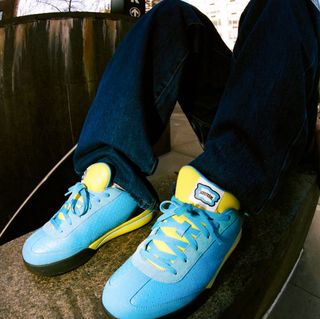 ICE CREAM Board Flip by Reebok (RBK), in a "Blue/Black/Yellow" color scheme.