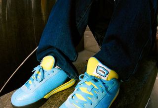 ICE CREAM Board Flip by Reebok (RBK), in a "Blue/Black/Yellow" color scheme.
