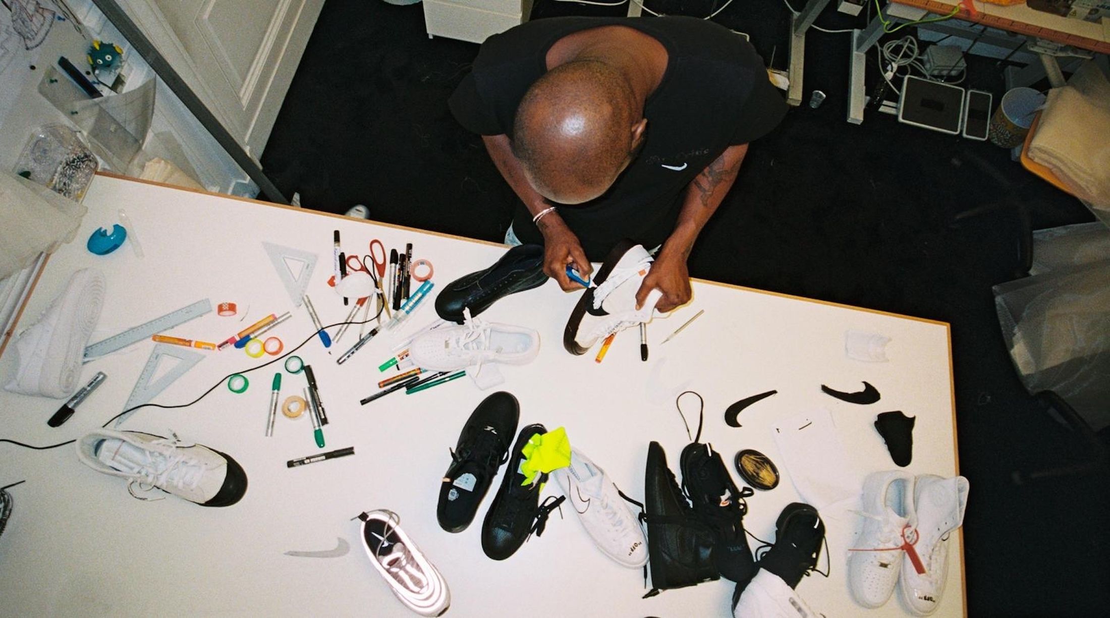 Virgil Abloh working on Nike "The Ten" Circa 2017. Photo via Nike.
