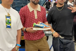 Javi Bandera & Joey Barba, co-founders of PAISABOYS, standing with Paul Rodriguez as he holds the PAISABOYS x Nike SB P-Rod 1 collaboration at ComplexCon LA 2026.