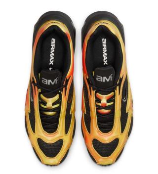 Top-down view of Nike's Air Max Muse in a yellow, black, and red color scheme.