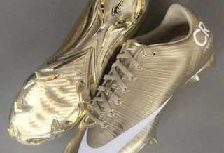 Golden pair of the Nike Mercurial Superfly 1 RGN, celebrating Cristiano Ronaldo's sixth appearance in the World Cup™.