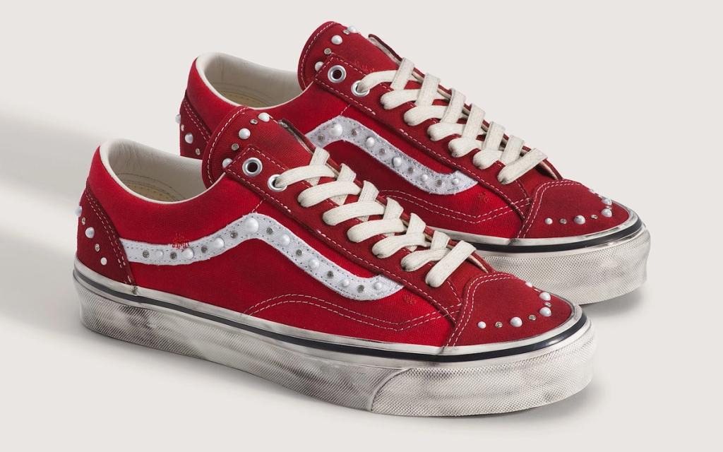 Vans Old Skool 36 in pearlized red colorway, showing the canvas upper with iridescent finish and classic side stripe