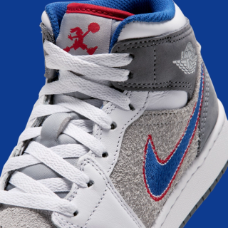 Big Kids's Space Jam x Air Jordan 1 Mid "Hare" (SKU: IZ4720-001). Photo via Nike.