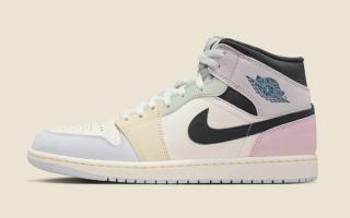 Air Jordan 1 Mid in a "Sail/Anthracite/Jade Aura/Iced Jade" color scheme.