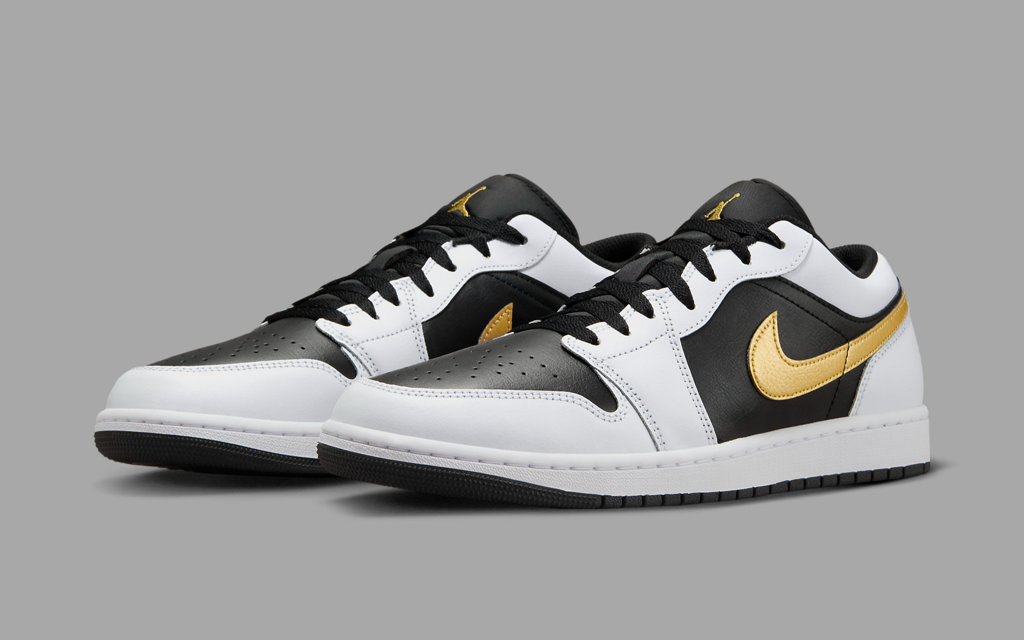 The Air Jordan 1 Low Appears With A Metallic Gold Swoosh House of Heat