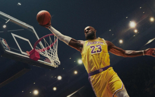 LeBron James dunking while wearing a number 23 Los Angeles Lakers Jersey.