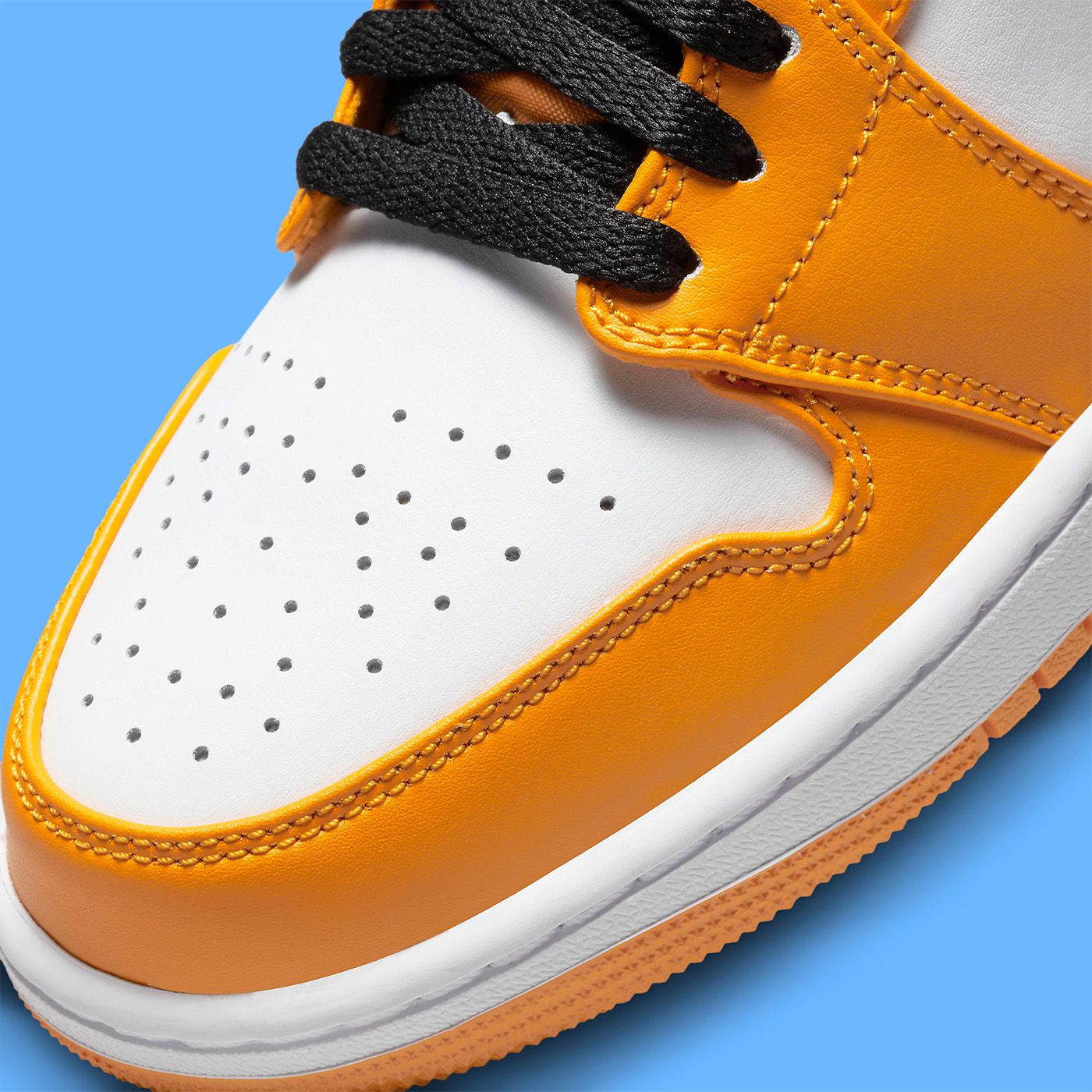 jordan 1 low university gold black white