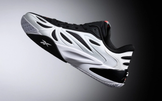 Reebok Angel Reese 1 "Receipts Ready" basketball shoe (white-and-black).