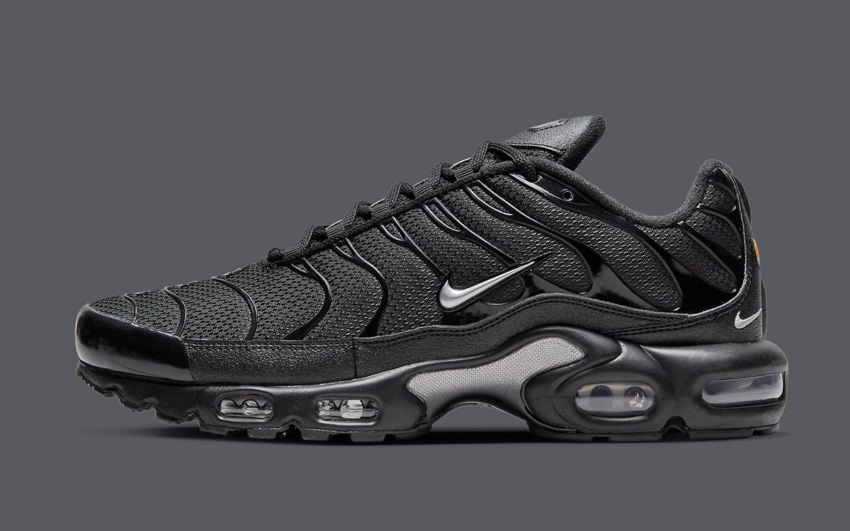 black nike with silver swoosh