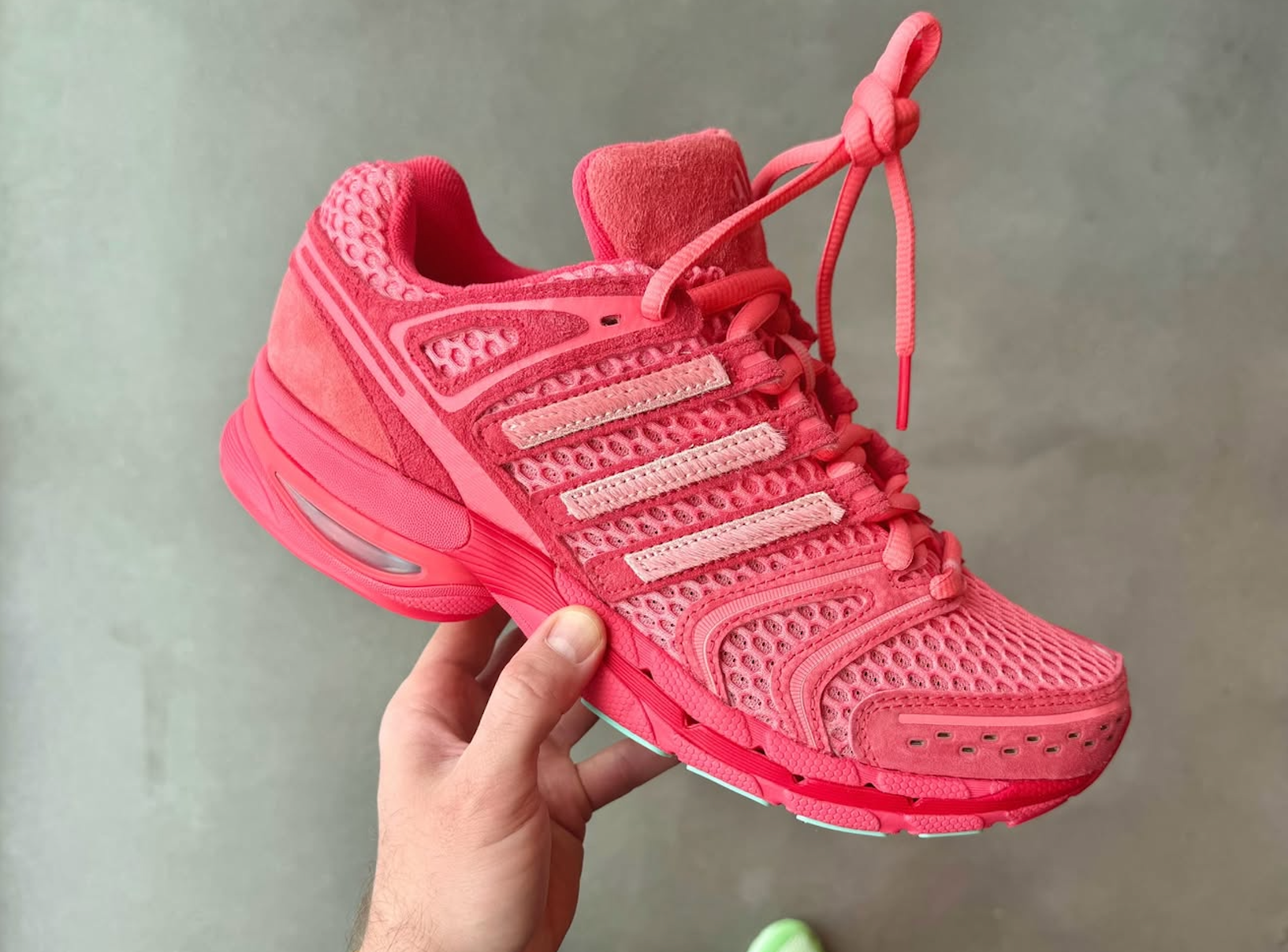 Unheardof's pink, piggy-inspired adidas Adistar Control 5 collaboration.