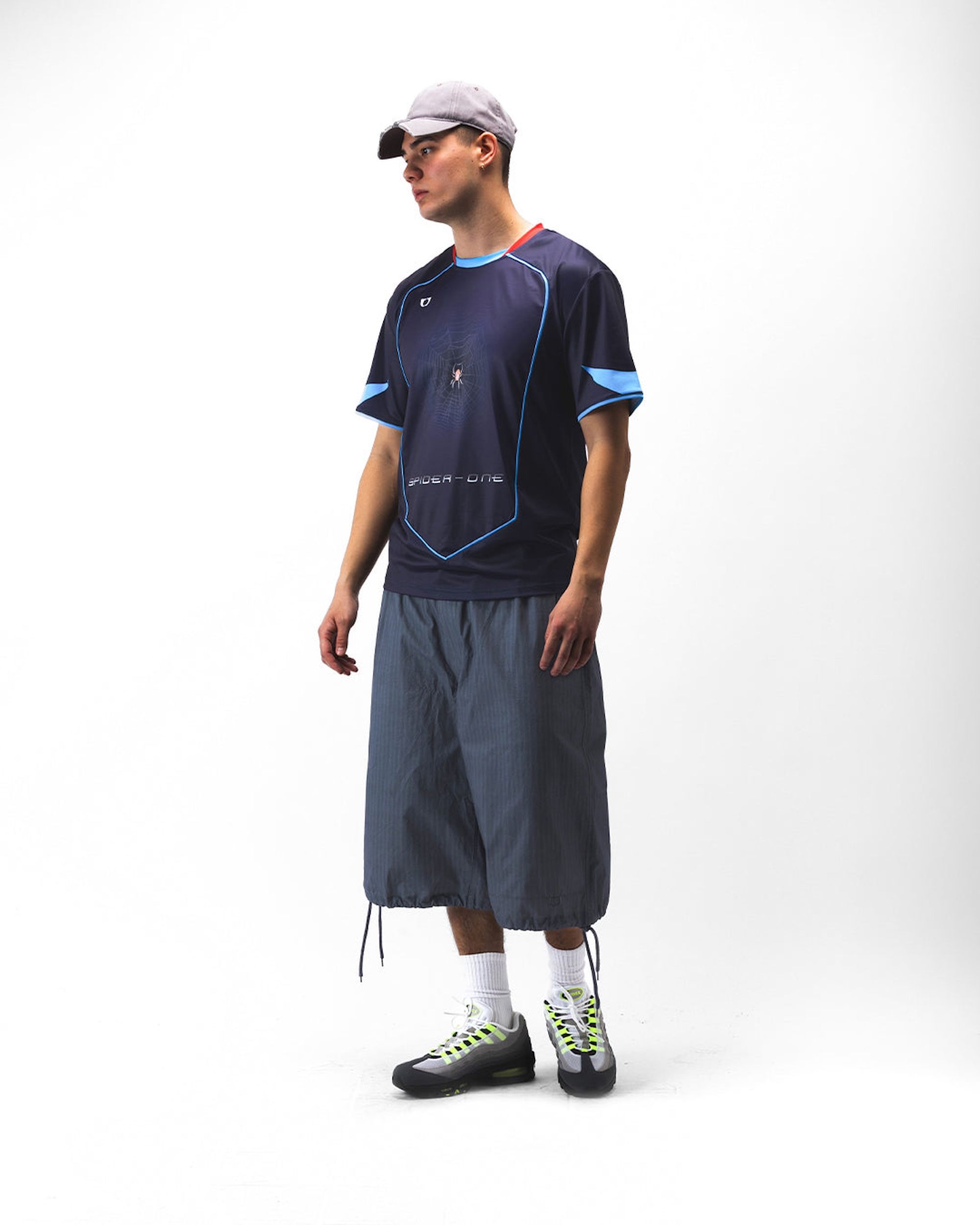 One Block Down's Spiderweb Soccer Tee, which takes inspiration from Atlético Madrid's Spider-Man 2 Away jersey from the 2004-05 season by Nike.