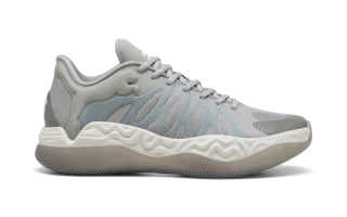 Tyrese Haliburton's PUMA Hali 1 in a grey-and-white color scheme.