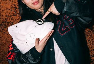 Syn Zhuang from Beijing with her winning Air Jordan 1 prototype from the first-ever global Jordan Design Studio contest.