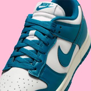 Close-up of Nike's Dunk Low clad in a "Green Abyss/Platinum Tint" color scheme.