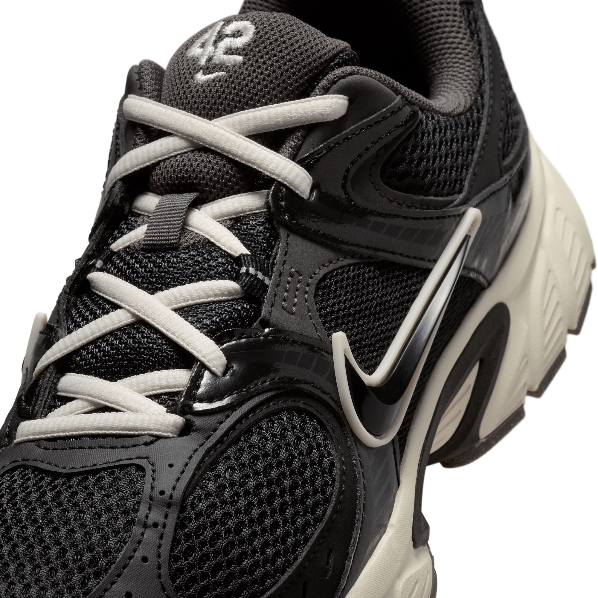 Jackie Robinson-inspired Nike V5 RNR sneaker in a black-and-off-white color scheme.