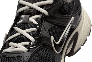 Jackie Robinson-inspired Nike V5 RNR sneaker in a black-and-off-white color scheme.